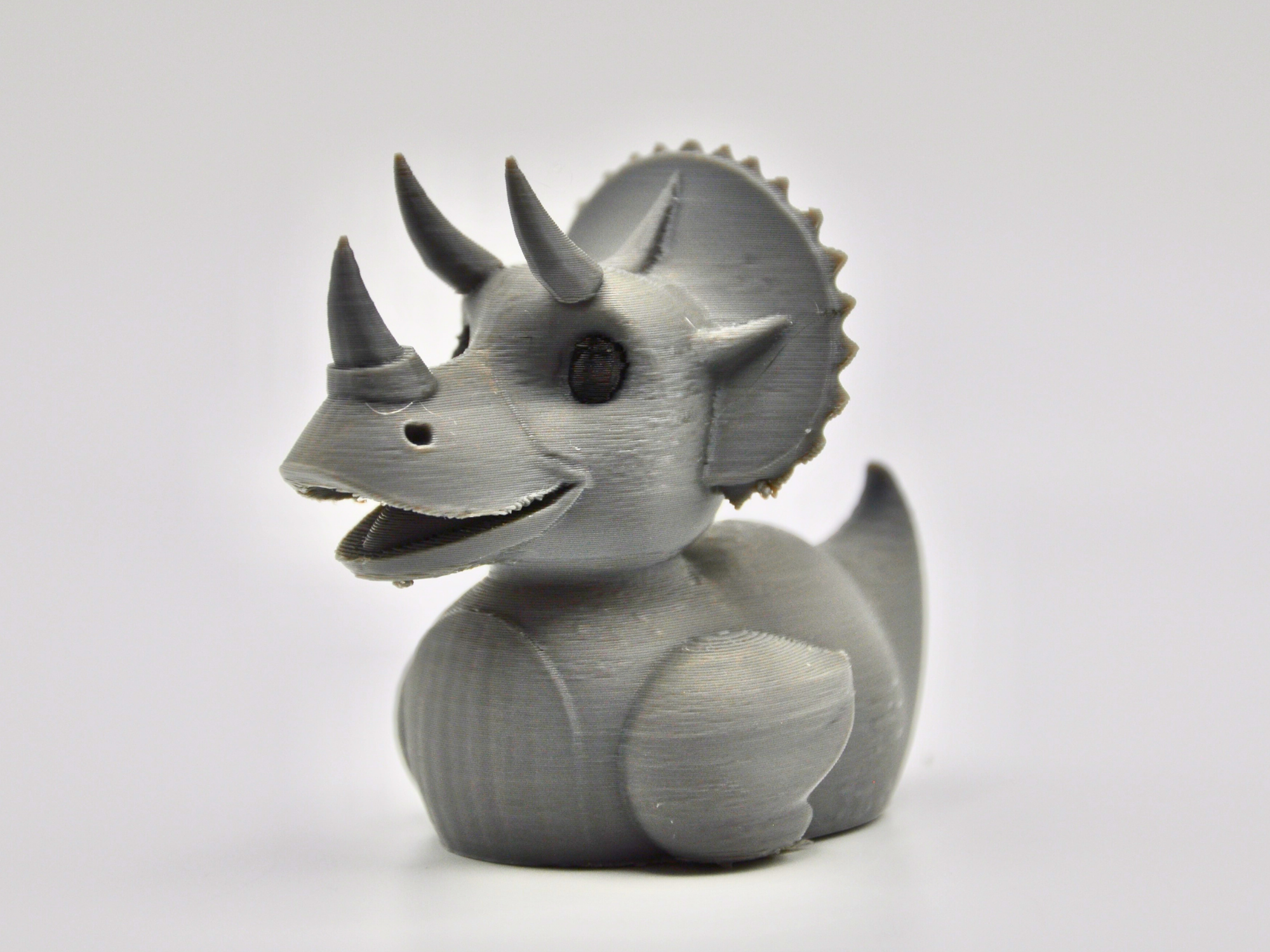 3D Printed Toy Duck Figure Model - Triceratops Duck image 0
