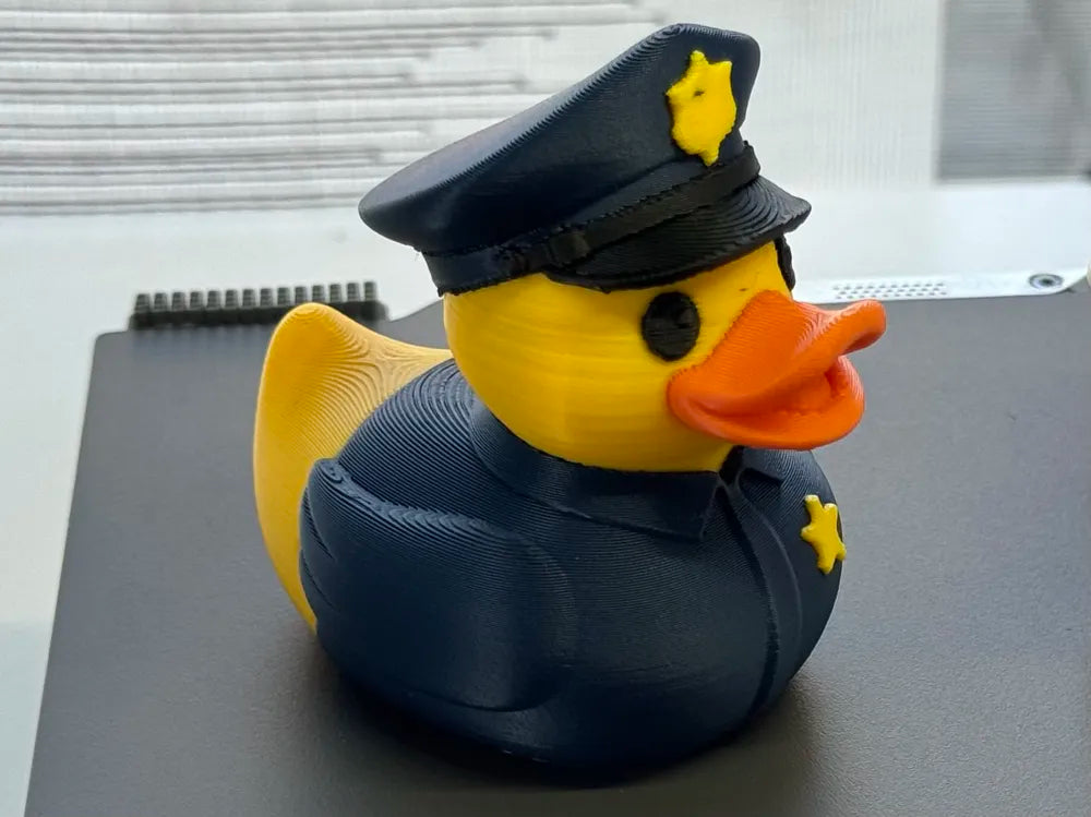 3D Printed Toy Duck Figure Model - Duck Cop image 0